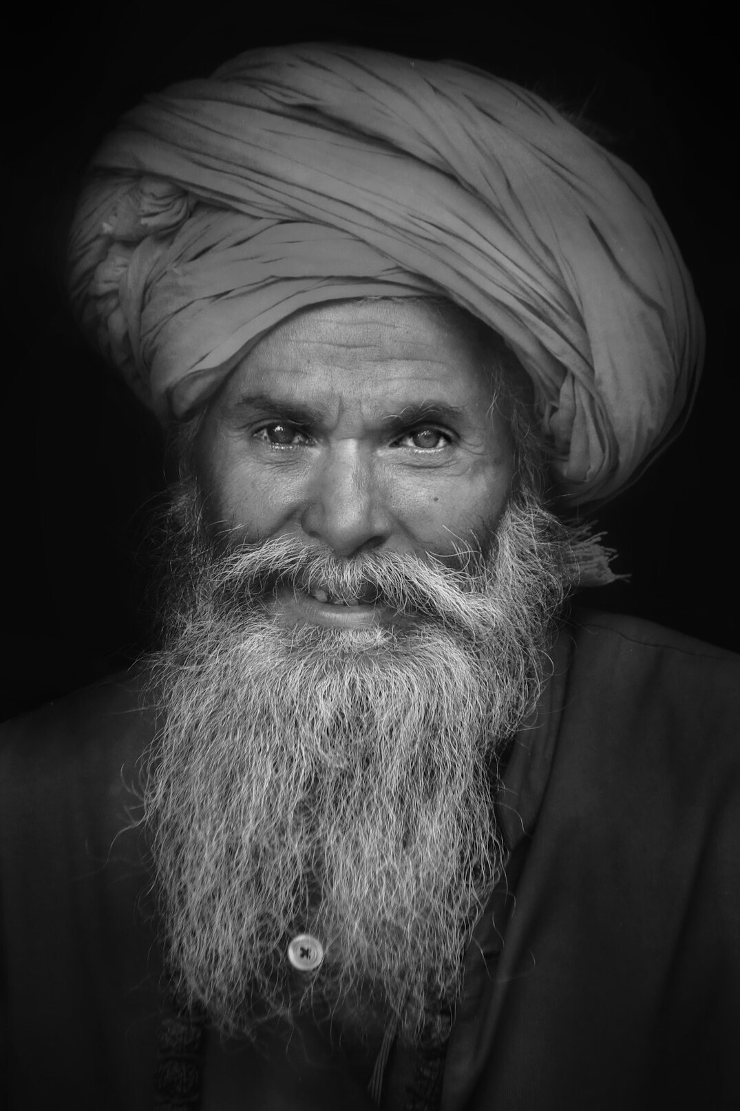 Studio portrait of a senior Turkish man media law consultant